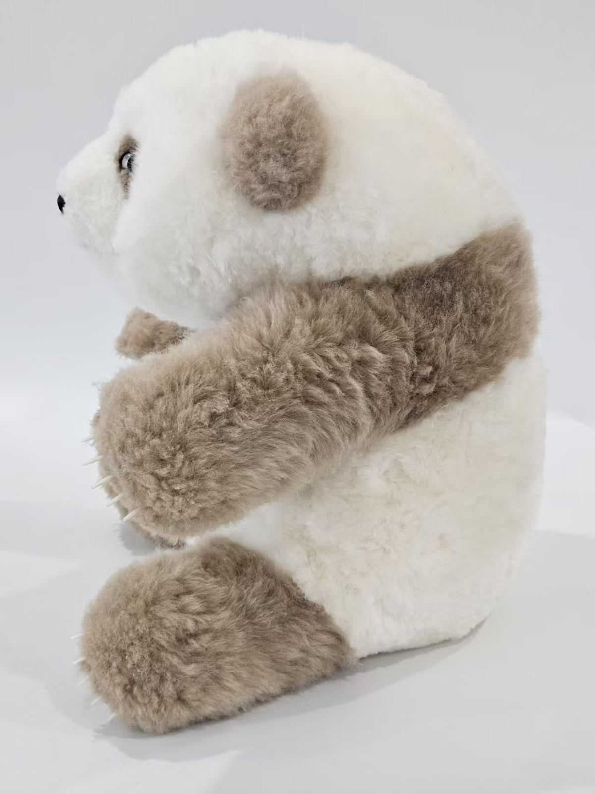 Qi Zai panda plush side view 40cm