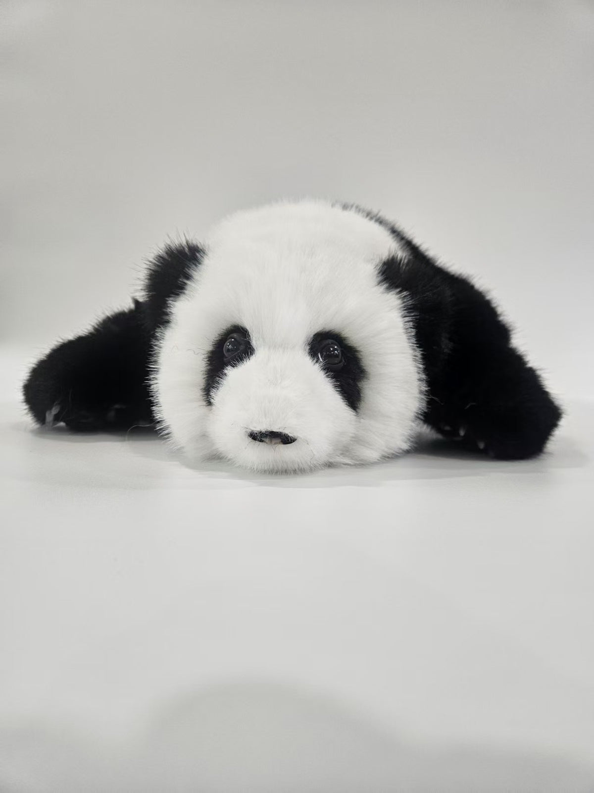 Handmade faux mink baby panda stuffed animal side view