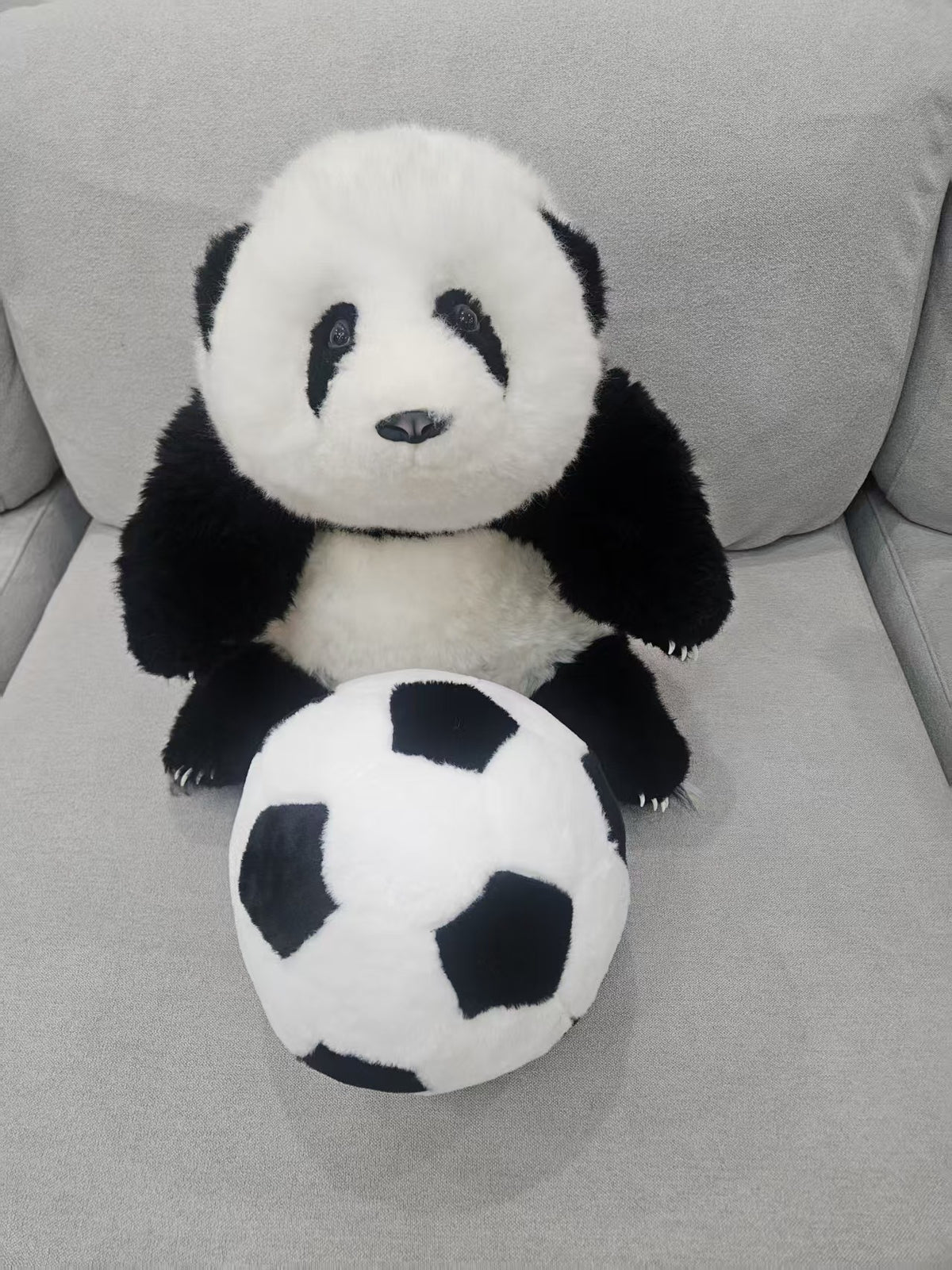 Panda and football plush set detail close up